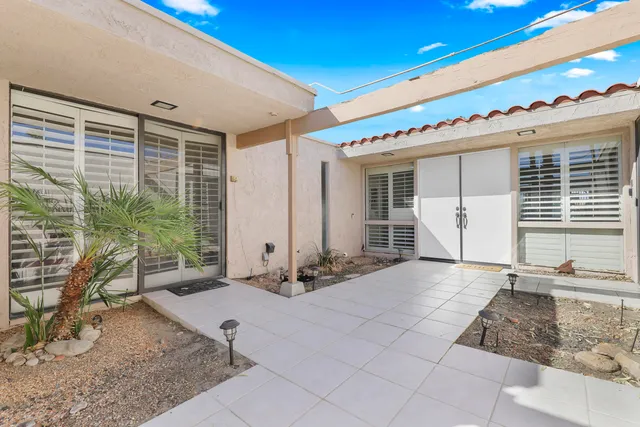 a view of a house with a balcony