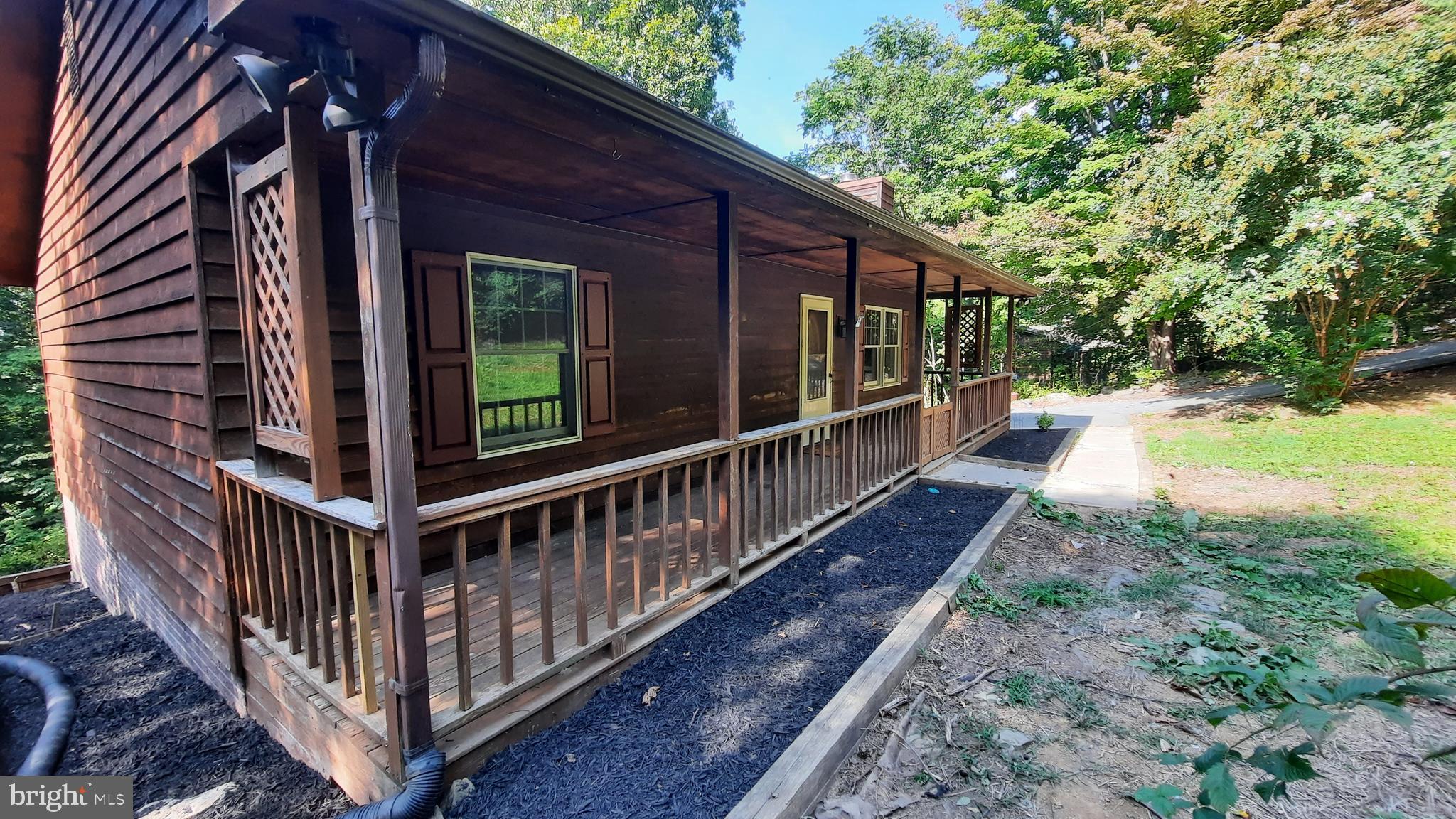 317 Long View Road Linden, VA 22642 - Photo 40 of 43 Front Porch and flower beds with fresh mulch