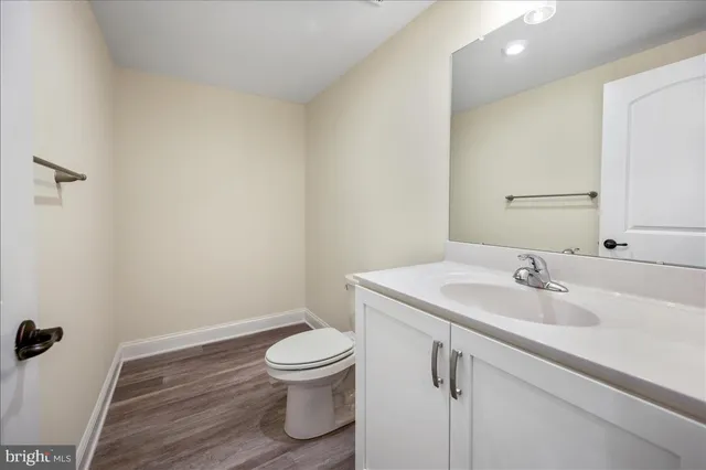 a bathroom with a sink and toilet