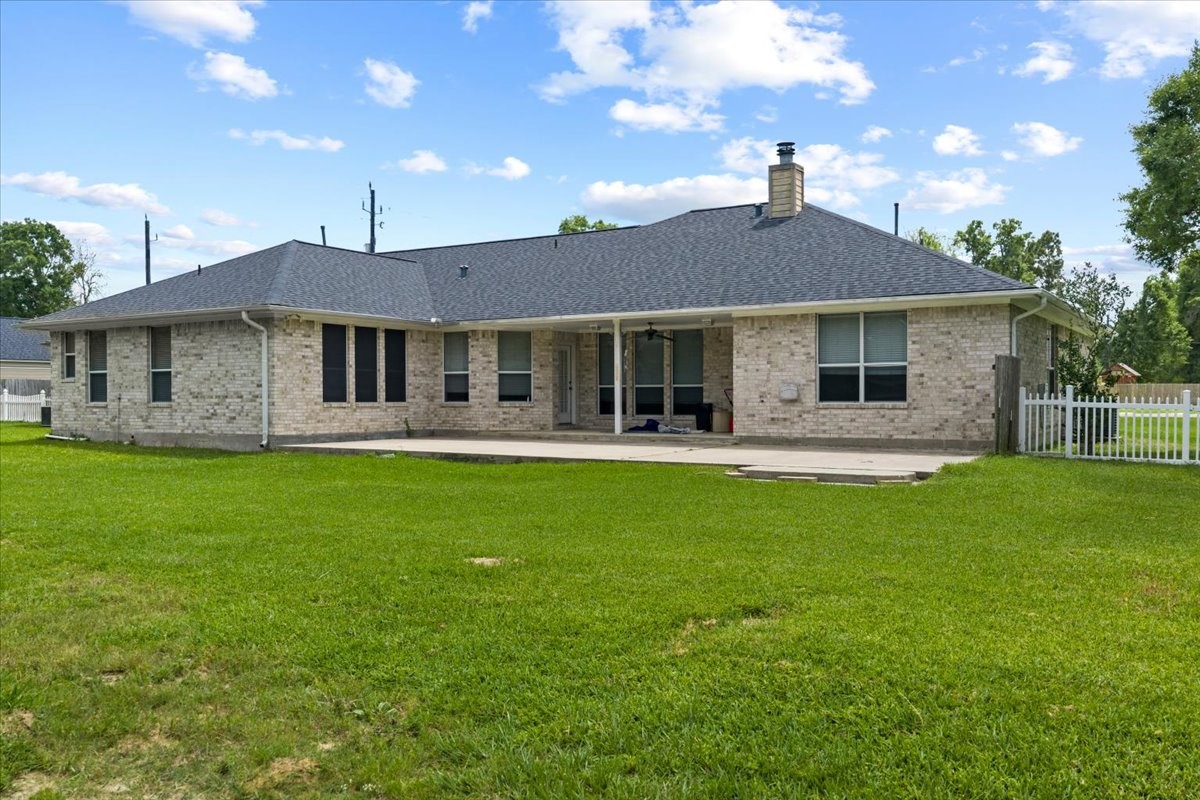 1607 Delta Lane Baytown, TX 77523 - Photo 38 of 48 The back of the home has a large concrete patio