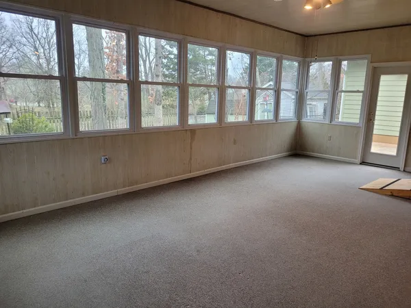 a view of an empty room and window