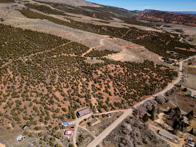 8094 West Red Cloud Loop Road Vernal, UT 84078 - Photo 21 of 35 View of rural area featuring a mountainous background and a desert landscape