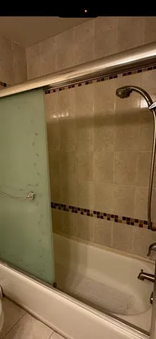 a close view of a bathtub in bathroom
