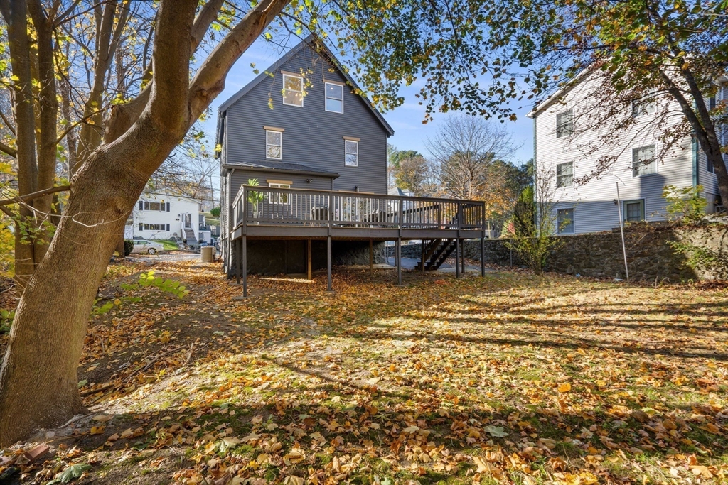 45 Charles Street Wakefield, MA 01880 - Photo 42 of 42 a view of a house with a yard