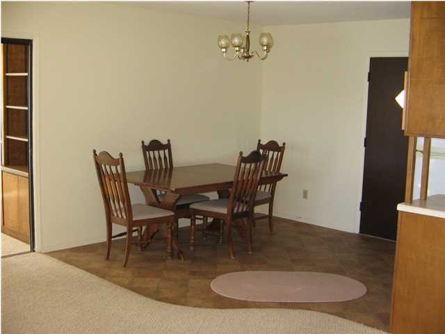 447 Paul Road DeFuniak Springs, FL 32433 - Photo 12 of 15 a dining room with furniture and wooden floor