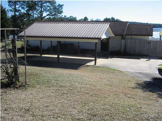 447 Paul Road DeFuniak Springs, FL 32433 - Photo 7 of 15 a front view of a house with a yard