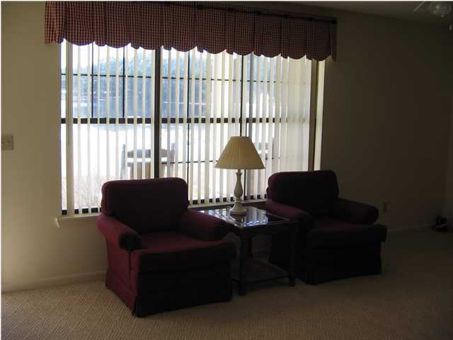 447 Paul Road DeFuniak Springs, FL 32433 - Photo 9 of 15 a living room with furniture and a large window