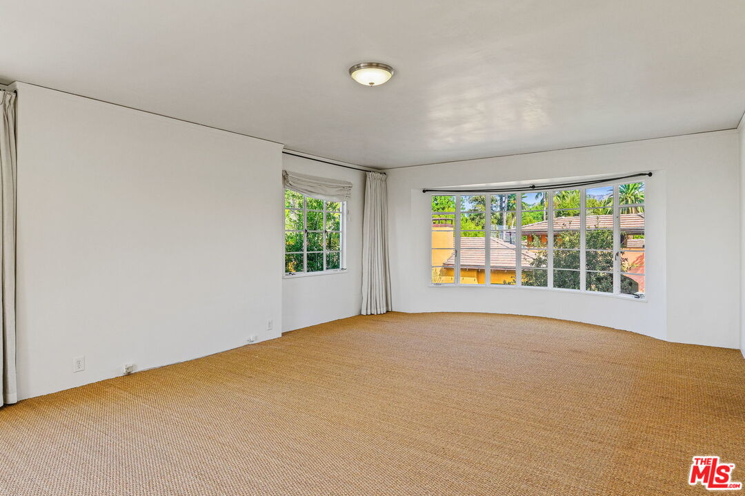 1968 Cummings Drive Los Angeles, CA 90027 - Photo 17 of 26 a view of an empty room with a window
