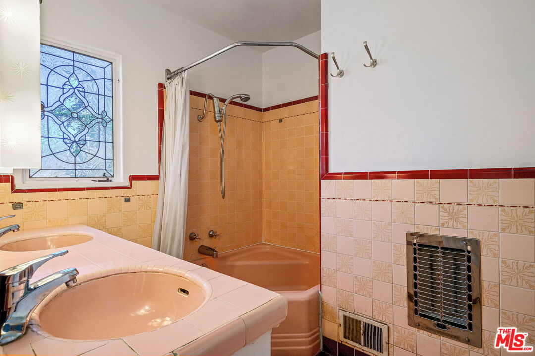 1968 Cummings Drive Los Angeles, CA 90027 - Photo 20 of 26 a bathroom with a bathtub and shower