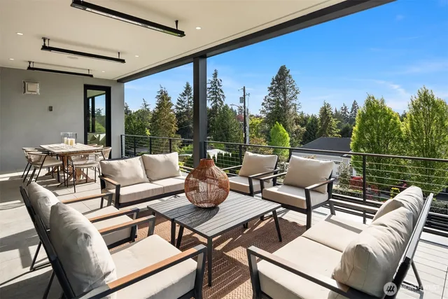 a outdoor living space with furniture and city view