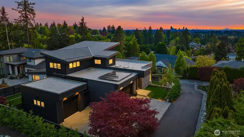 a view of a patio with table and chairs and a potted plants