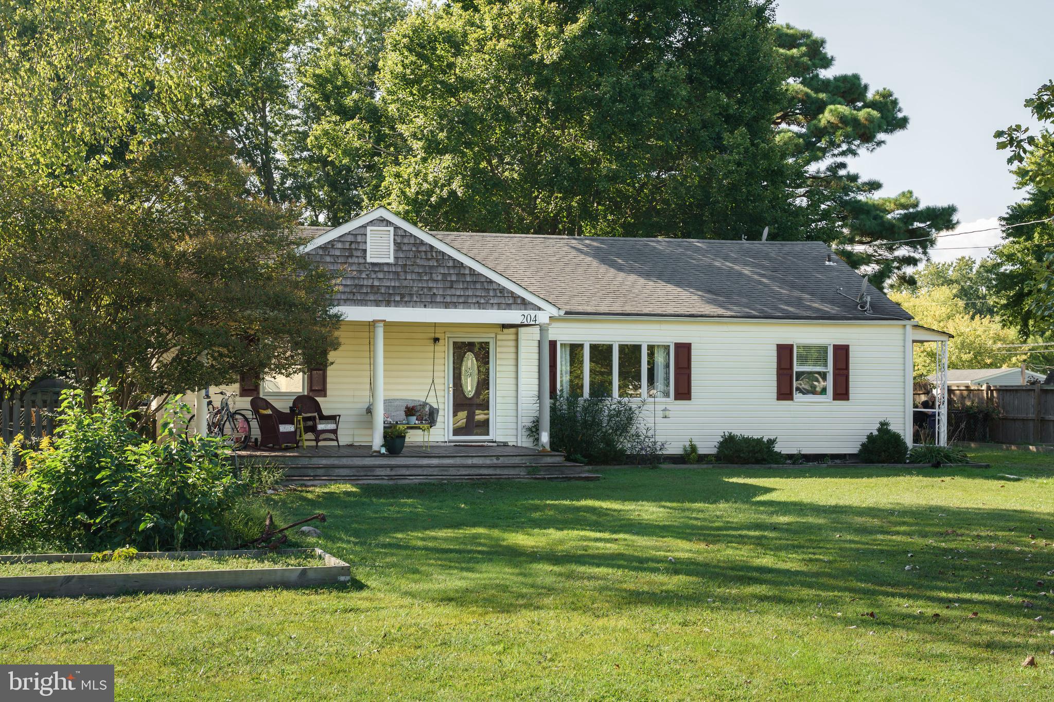 204 Long Point Road Stevensville, MD 21666 - Photo 34 of 34 a front view of a house with a yard