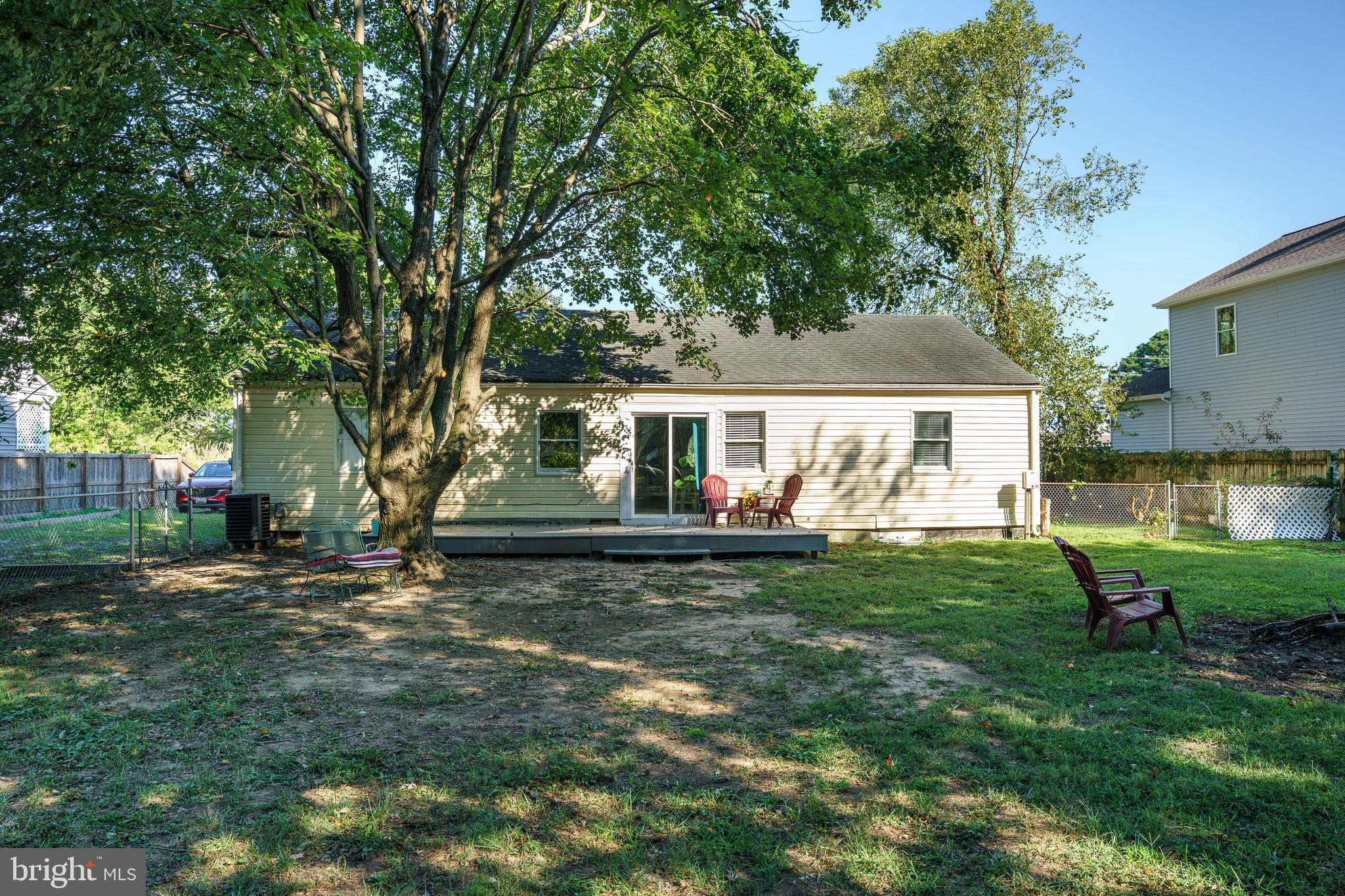 204 Long Point Road Stevensville, MD 21666 - Photo 5 of 34 a view of a house with backyard and a tree
