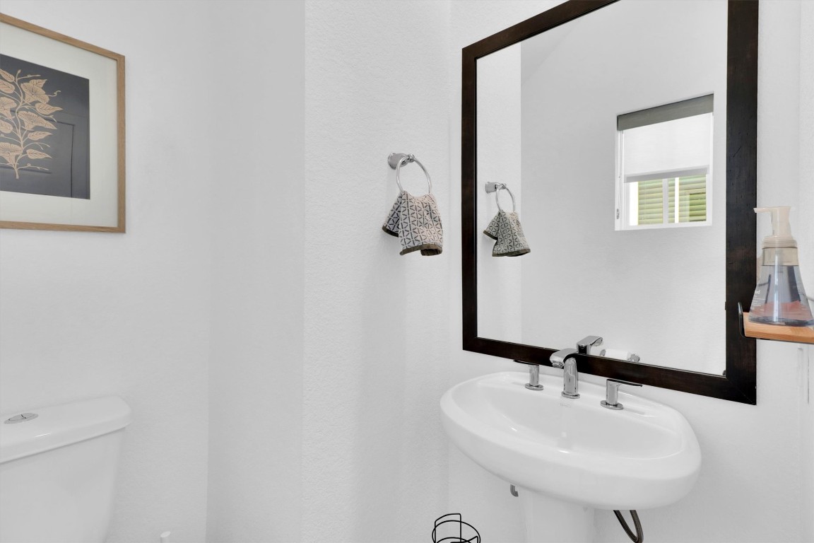 4806 Olive Sparrow Drive, Unit C Austin, TX 78723 - Photo 14 of 32 Bathroom featuring toilet