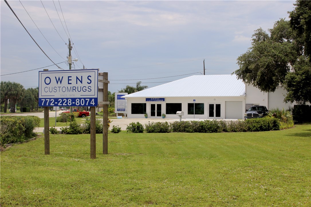 8050 Highway 1 Vero Beach, FL 32967 - Photo 15 of 16 a front view of a house with garden