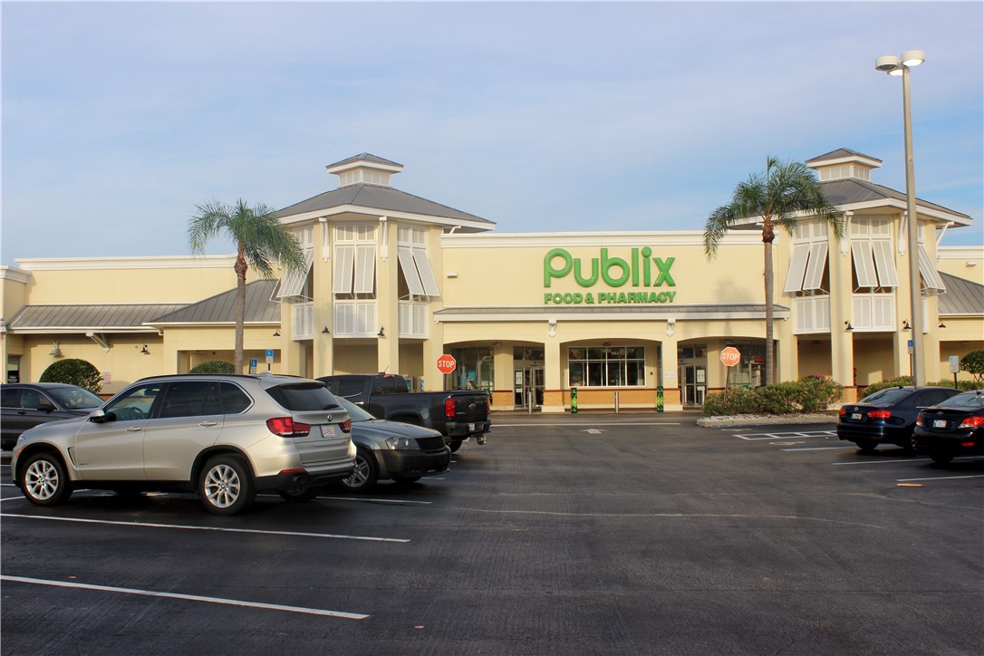 8050 Highway 1 Vero Beach, FL 32967 - Photo 8 of 16 a cars parked in front of a building