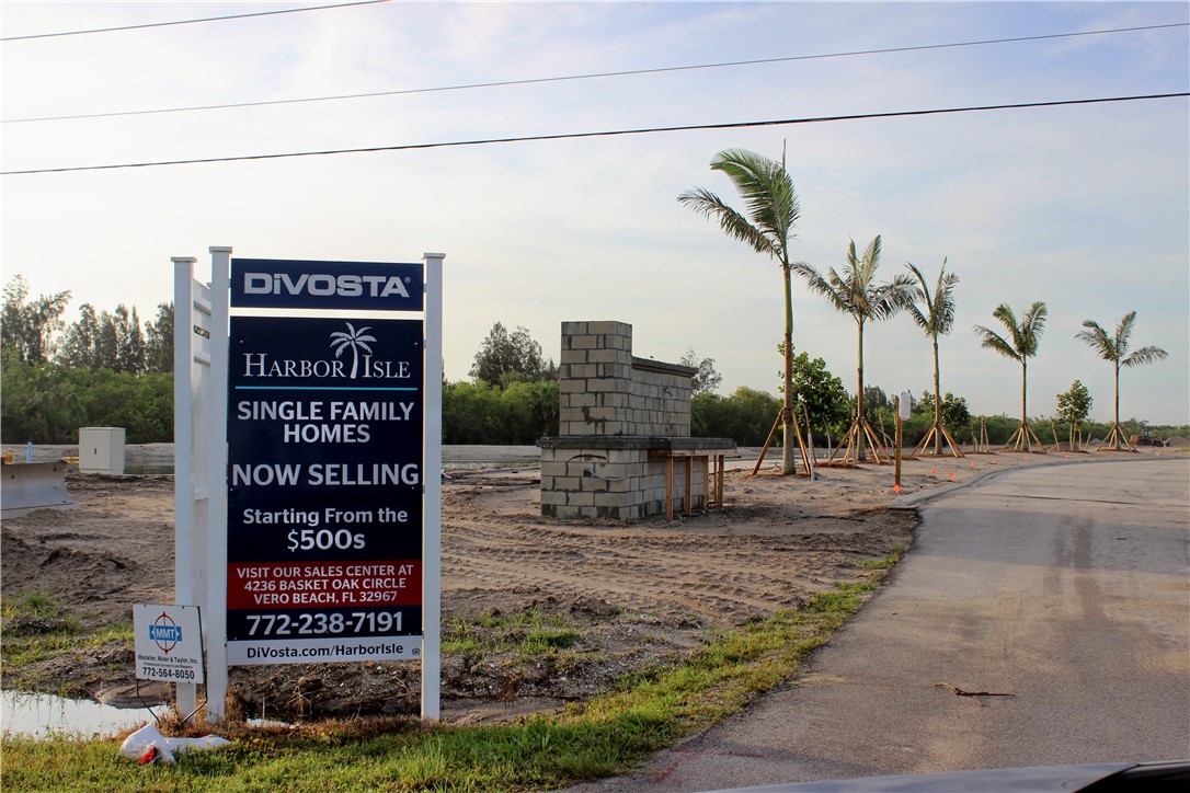 8050 Highway 1 Vero Beach, FL 32967 - Photo 9 of 16 a sign on the side of a street