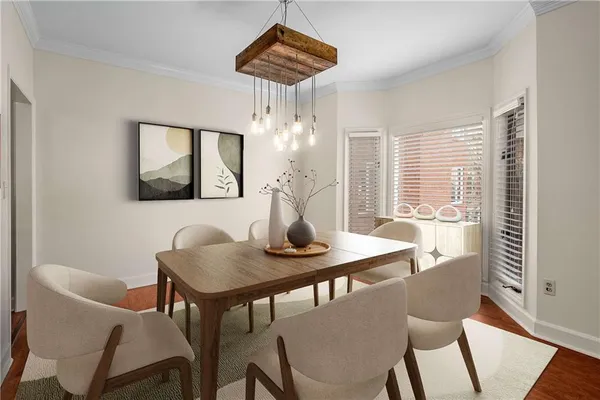 a view of a dining room with furniture window and outside view