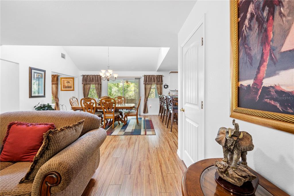 7347 Packingham Drive Webster, FL 33597 - Photo 21 of 75 a living room with furniture and wooden floor