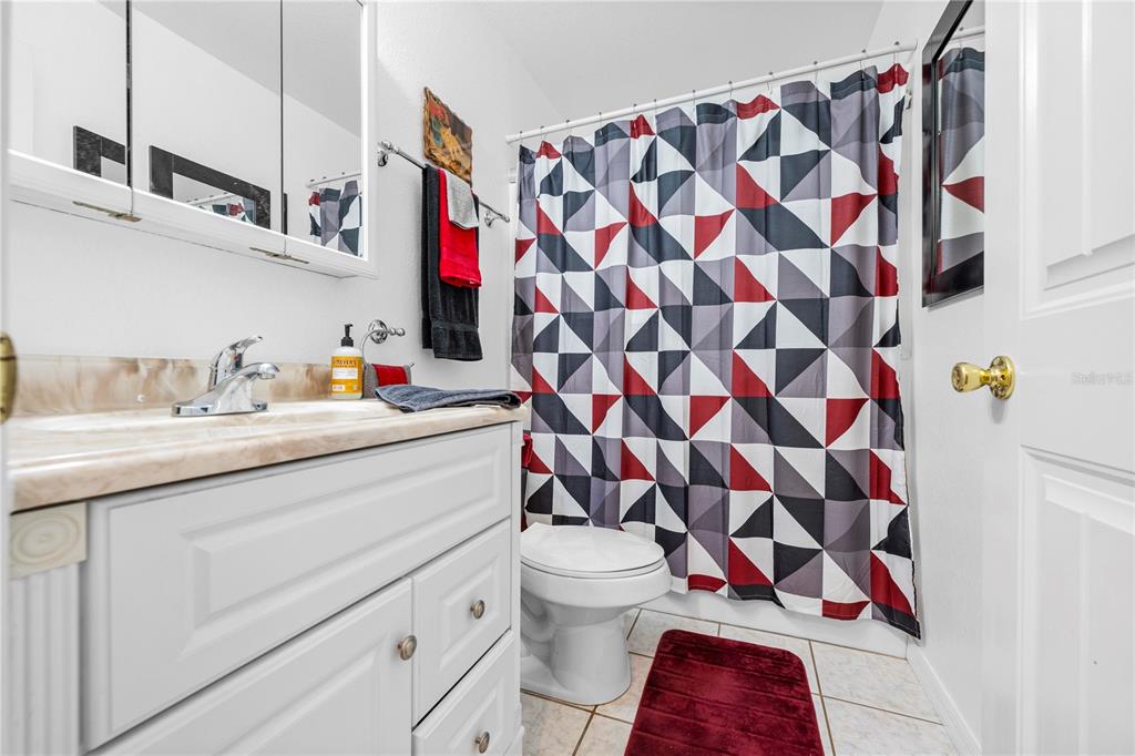 7347 Packingham Drive Webster, FL 33597 - Photo 34 of 75 a bathroom with a sink and a toilet