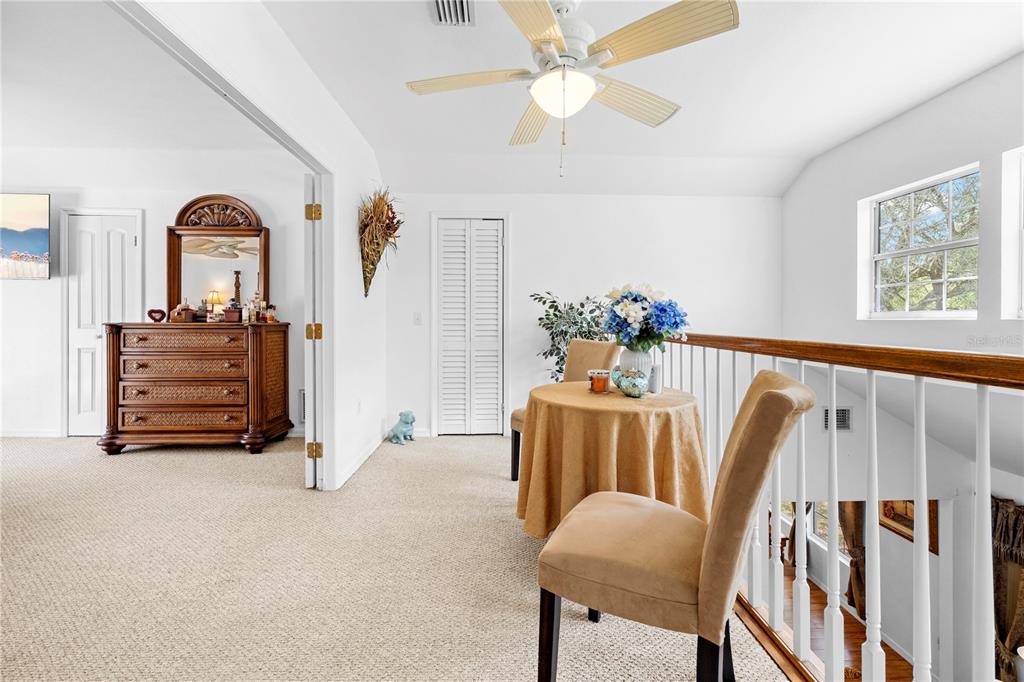 7347 Packingham Drive Webster, FL 33597 - Photo 39 of 75 a view of living room filled with furniture and chandelier