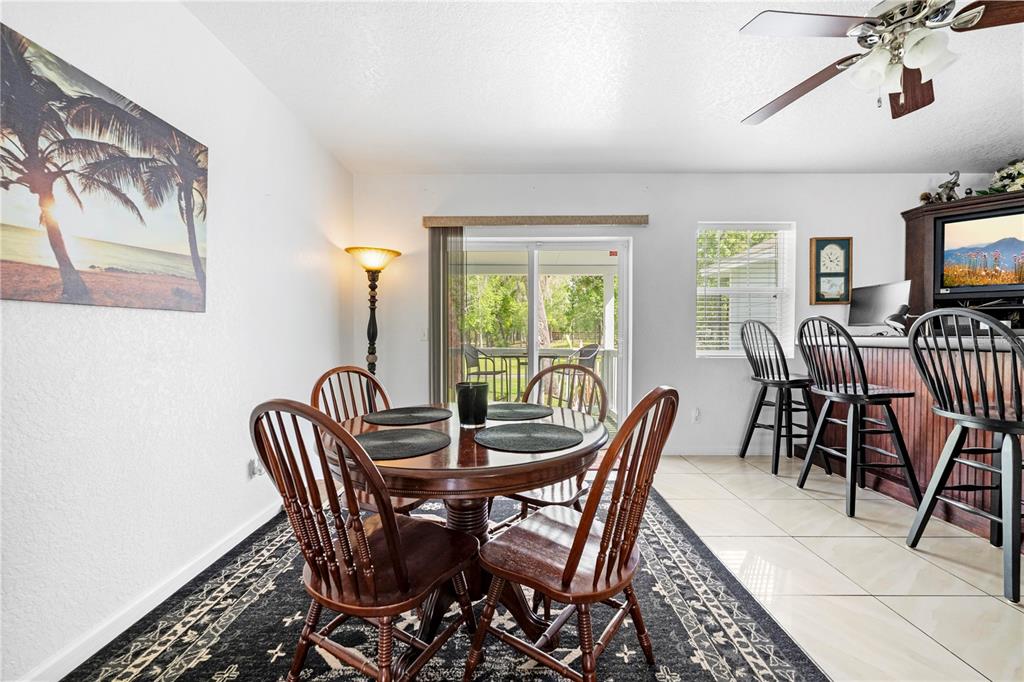 7347 Packingham Drive Webster, FL 33597 - Photo 48 of 75 a view of a dining room with furniture and a window