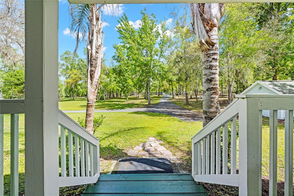 7347 Packingham Drive Webster, FL 33597 - Photo 6 of 75 a view of a balcony with lake view