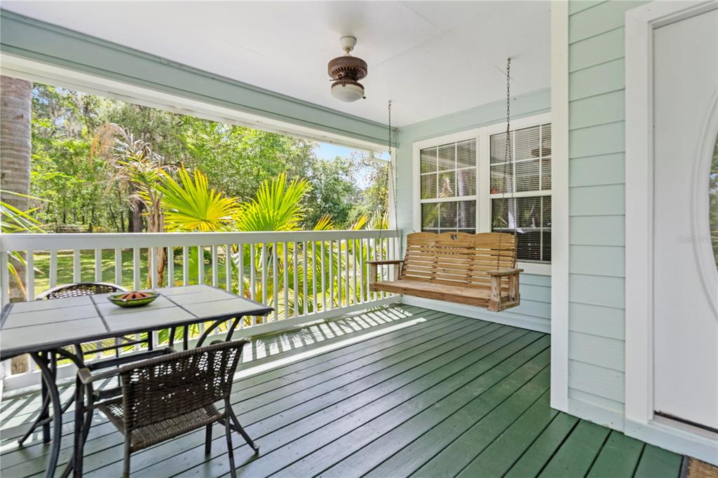 7347 Packingham Drive Webster, FL 33597 - Photo 7 of 75 a view of a dining room with furniture window and wooden floor