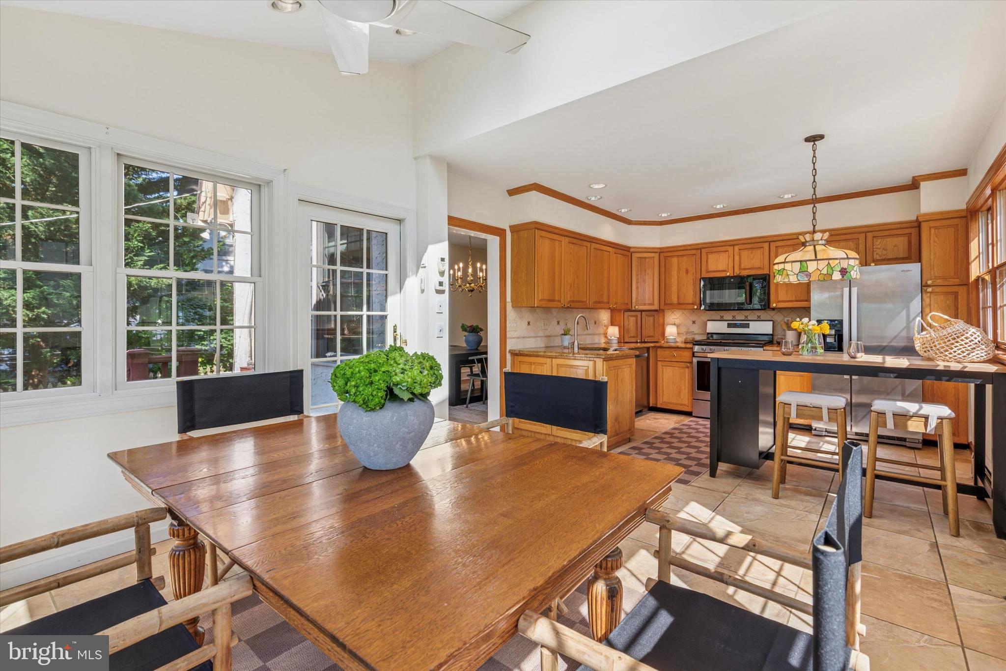 508 Baird Road Merion Station, PA 19066 - Photo 13 of 52 a view of a dining room with furniture window and outside view