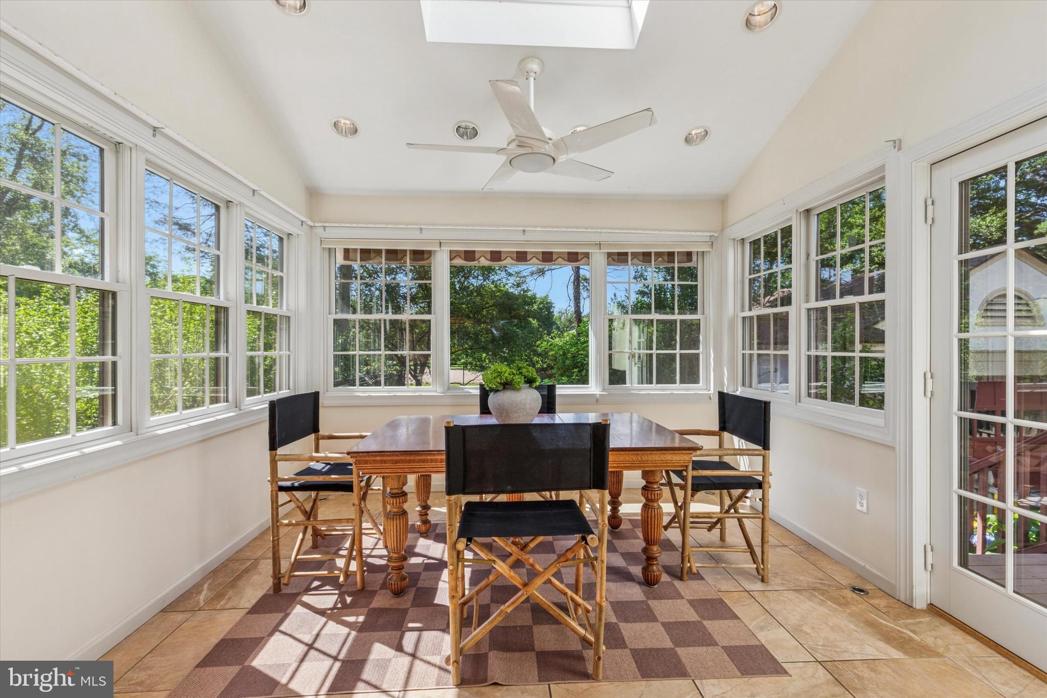 508 Baird Road Merion Station, PA 19066 - Photo 17 of 52 a view of a dining room with furniture large windows and wooden floor