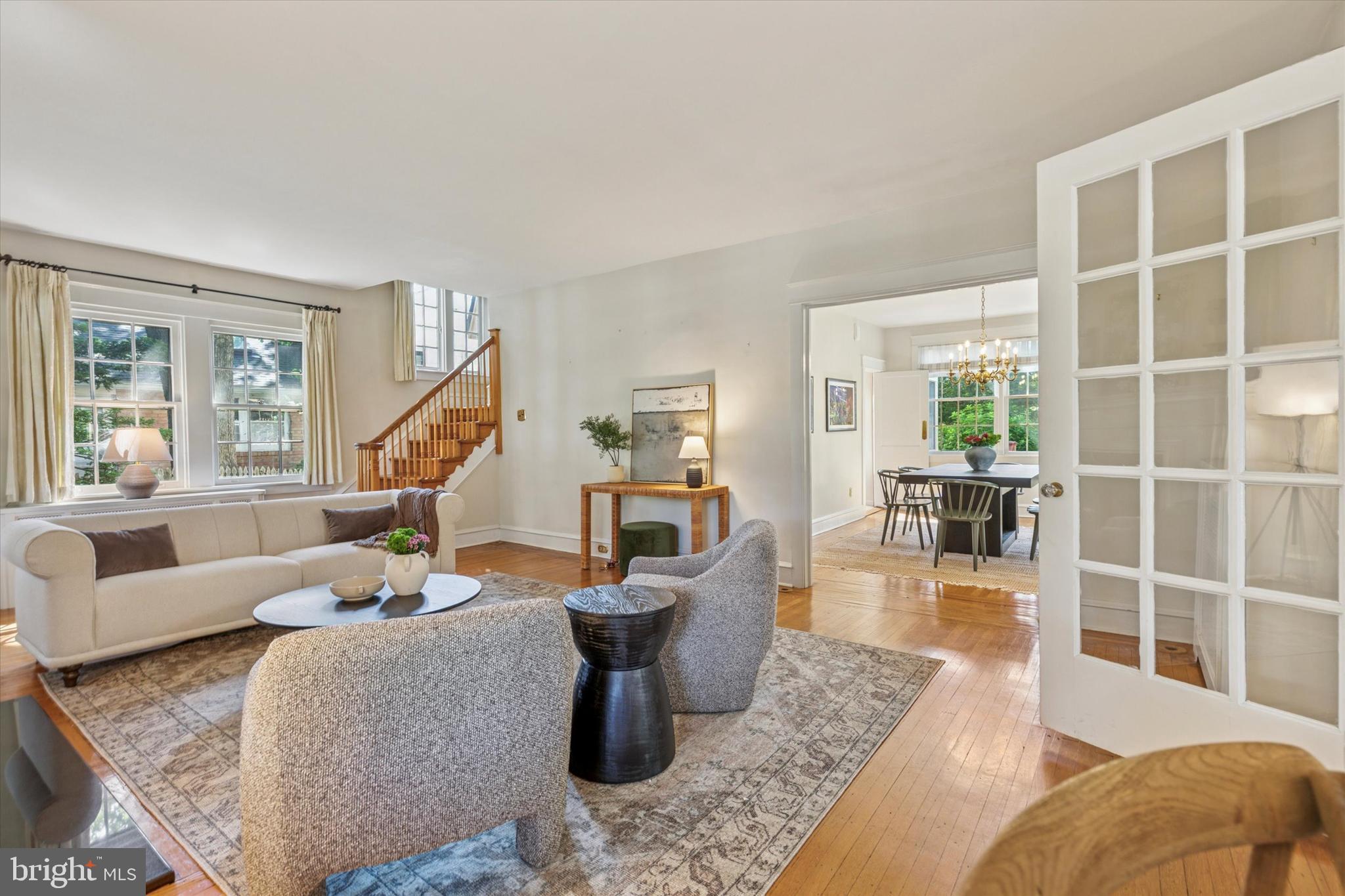 508 Baird Road Merion Station, PA 19066 - Photo 21 of 52 a living room with furniture large windows and wooden floor
