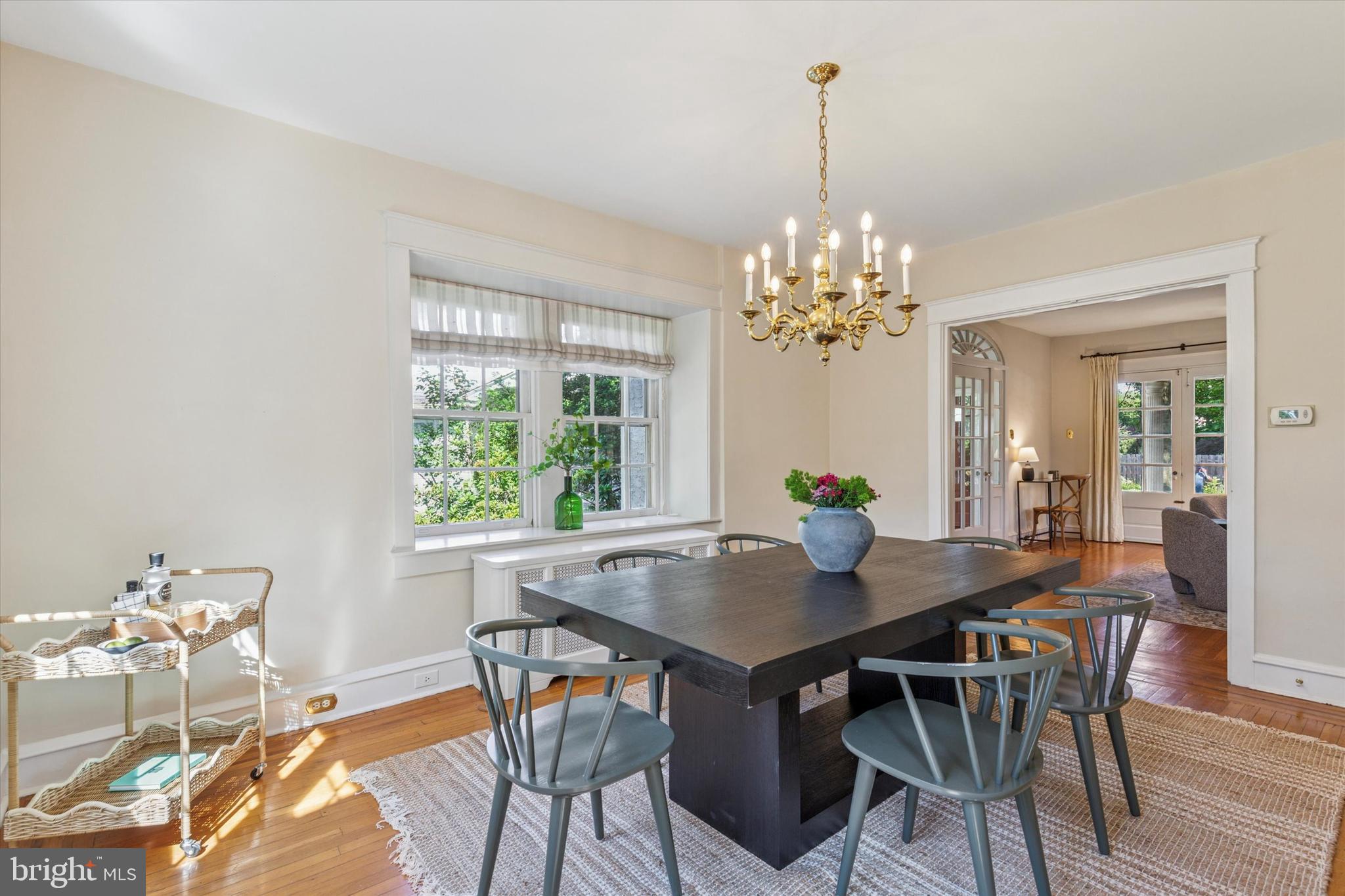 508 Baird Road Merion Station, PA 19066 - Photo 24 of 52 a dining room with furniture a rug and a chandelier