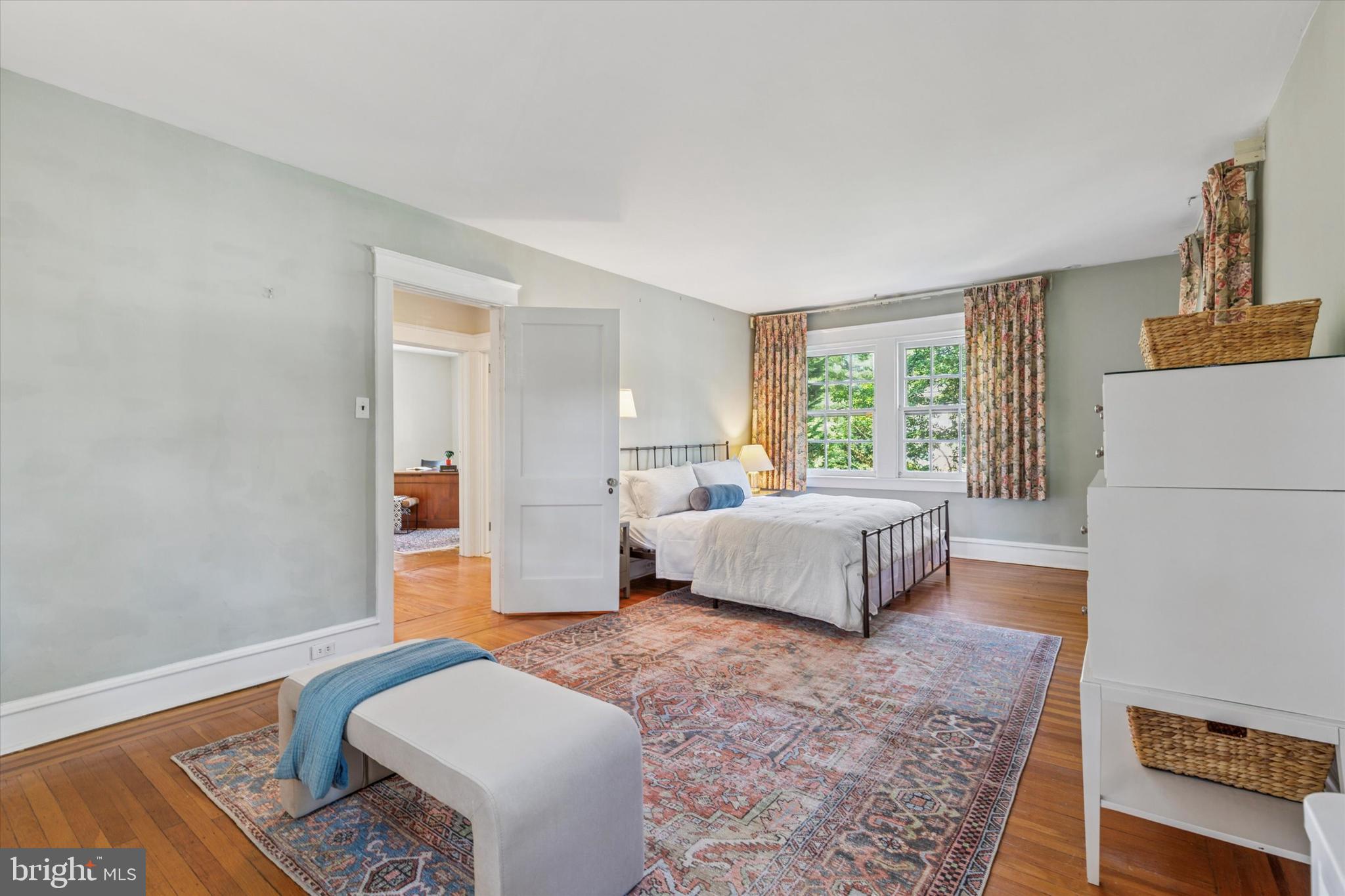 508 Baird Road Merion Station, PA 19066 - Photo 30 of 52 a spacious bedroom with a bed and a couch