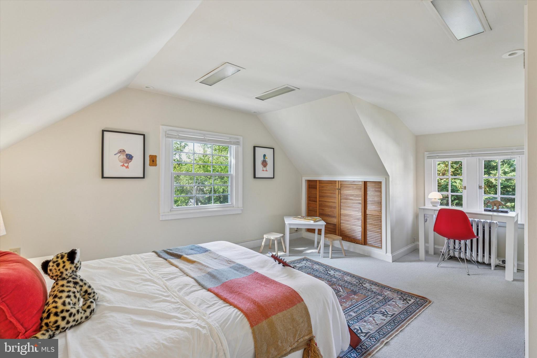508 Baird Road Merion Station, PA 19066 - Photo 40 of 52 a bedroom with a bed and glass window