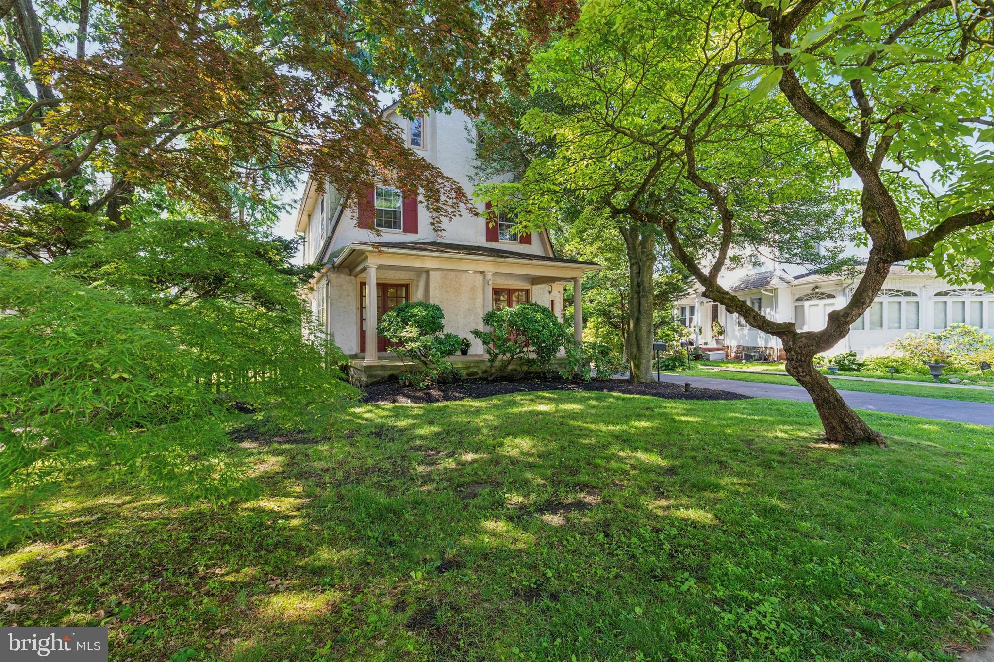 508 Baird Road Merion Station, PA 19066 - Photo 4 of 52 a house that has tree in front of it