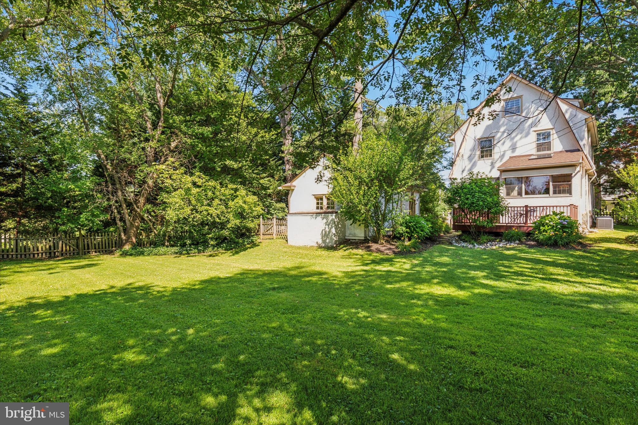 508 Baird Road Merion Station, PA 19066 - Photo 45 of 52 a front view of a house with a yard and trees