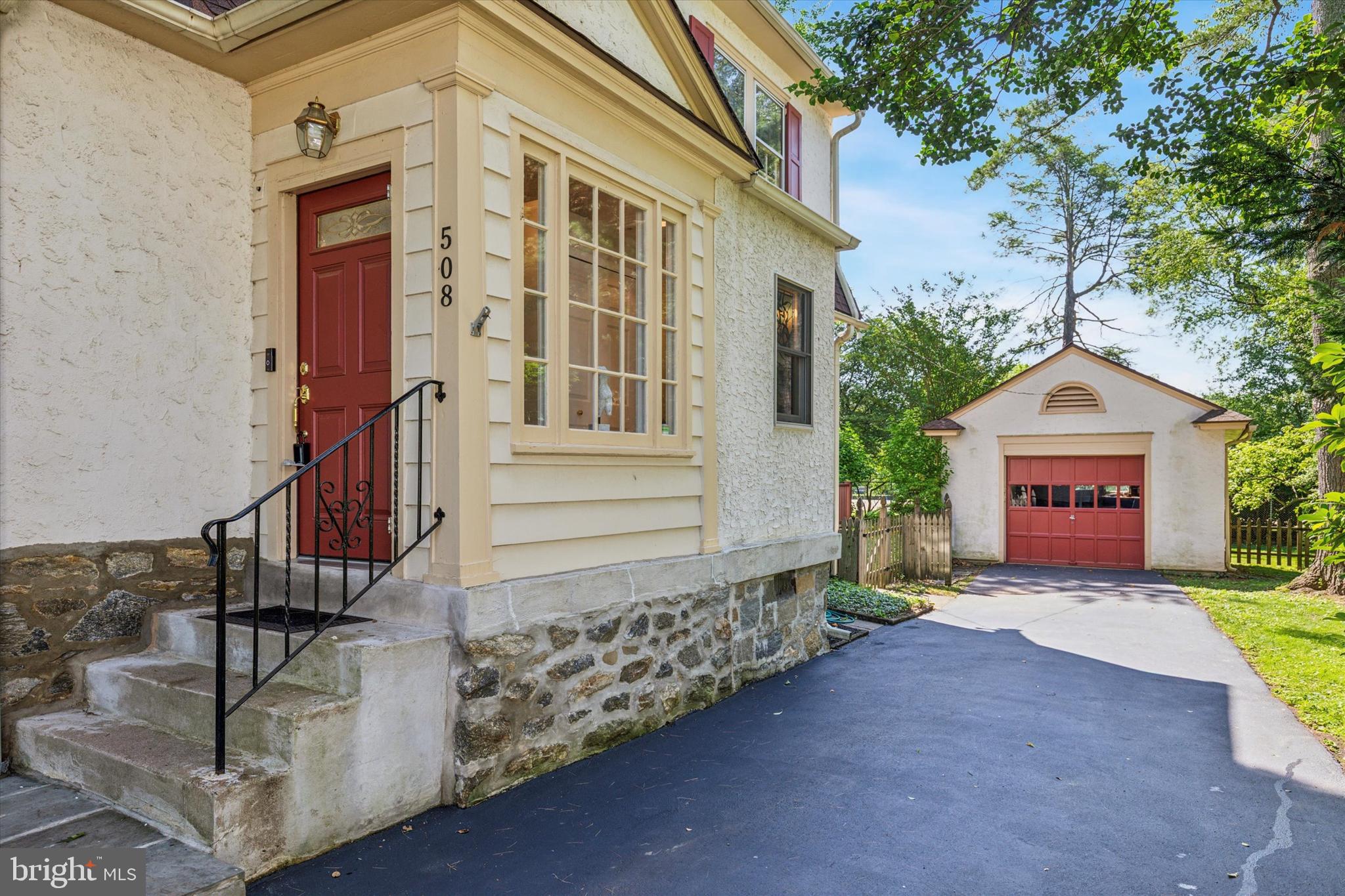 508 Baird Road Merion Station, PA 19066 - Photo 6 of 52 a front view of a house with a yard