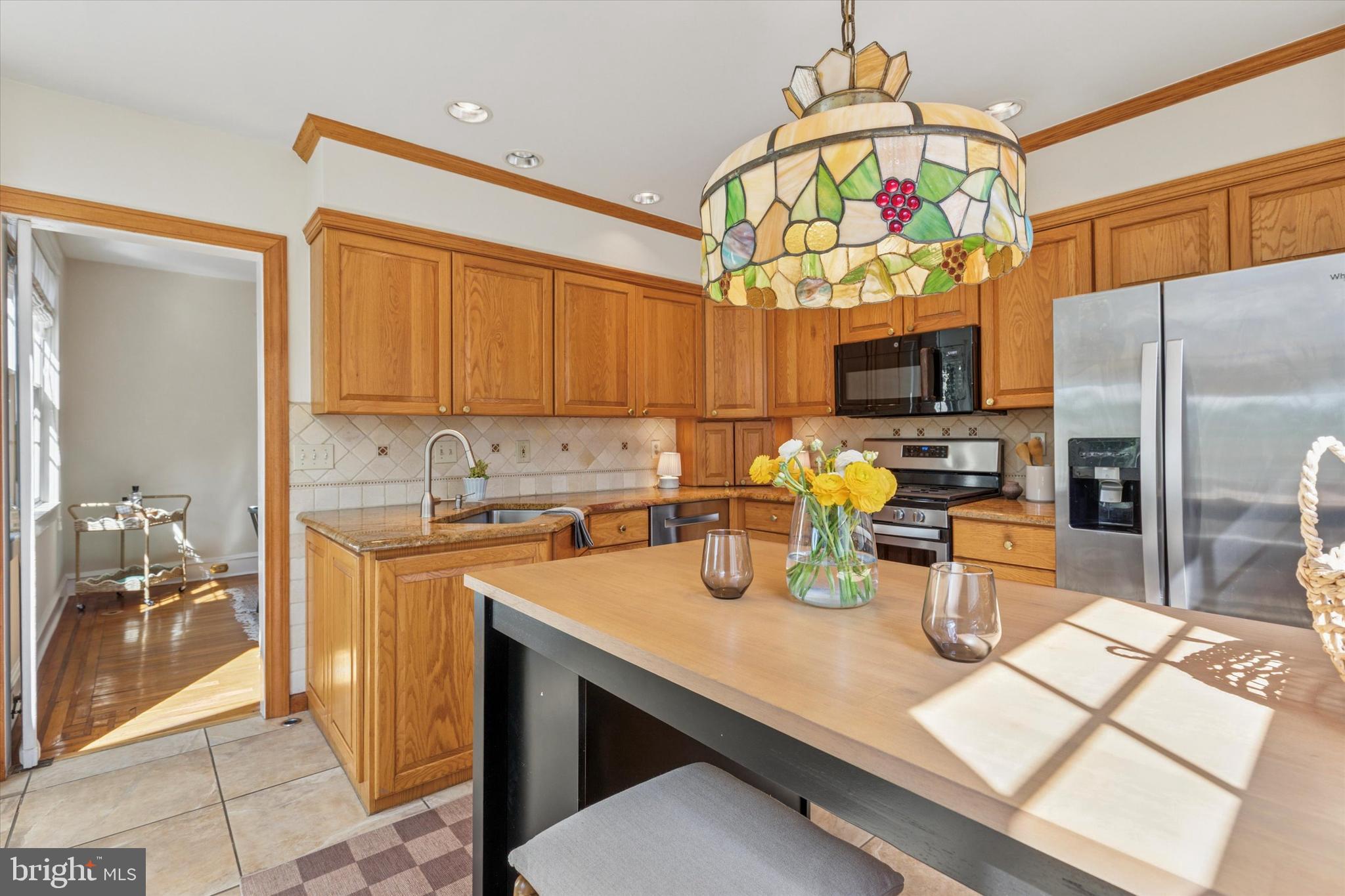 508 Baird Road Merion Station, PA 19066 - Photo 10 of 52 a kitchen with a refrigerator and a sink