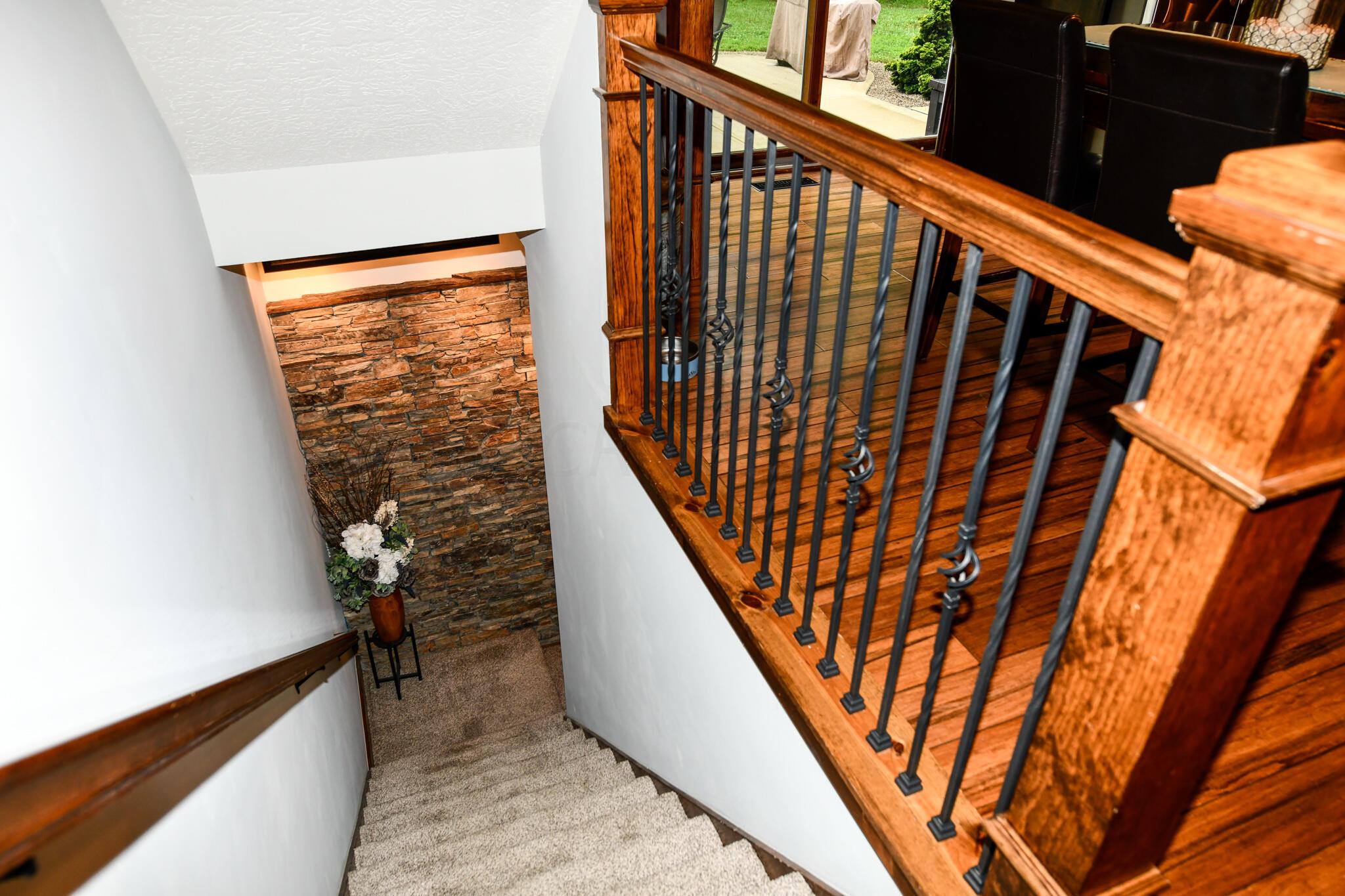 2120 Burnt Pond Road Ostrander, OH 43061 - Photo 22 of 52 Stacked Stone Accent Wall to Bsmt.