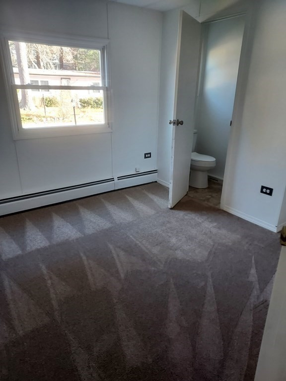 59 Longboat Road Wareham, MA 02576 - Photo 12 of 13 an empty room with a window