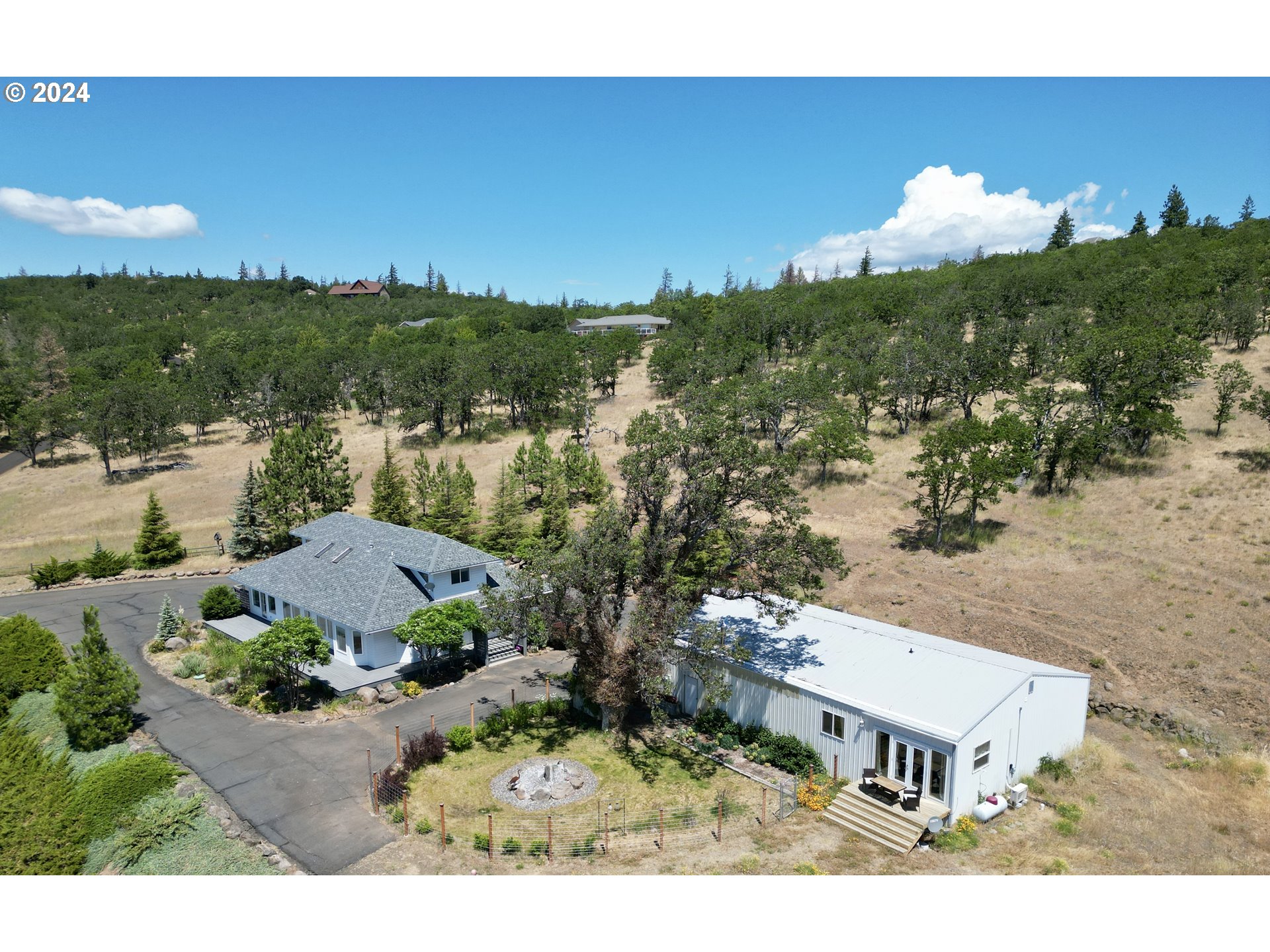 110 Eagle Drive Goldendale, WA 98620 - Photo 1 of 48 a view of a house with a yard and lake view