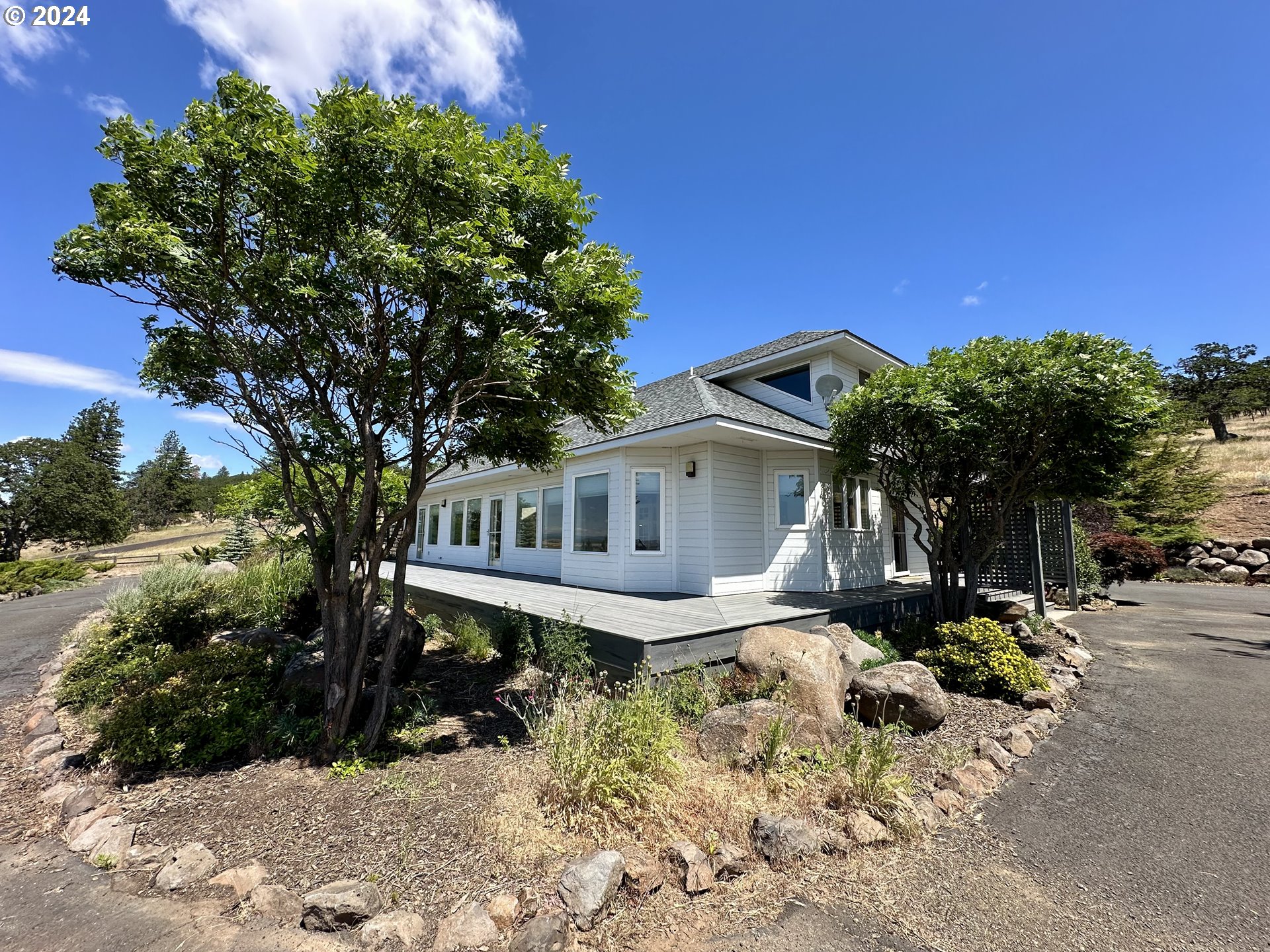 110 Eagle Drive Goldendale, WA 98620 - Photo 14 of 48 a front view of a house with a yard