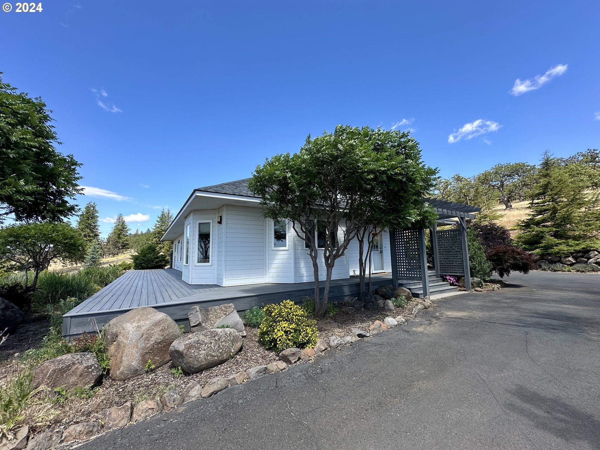 110 Eagle Drive Goldendale, WA 98620 - Photo 16 of 48 a front view of a house with a yard