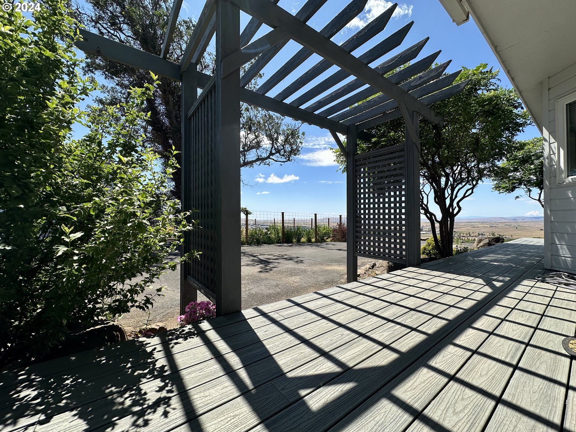 110 Eagle Drive Goldendale, WA 98620 - Photo 18 of 48 a view of backyard with wooden floor and fence