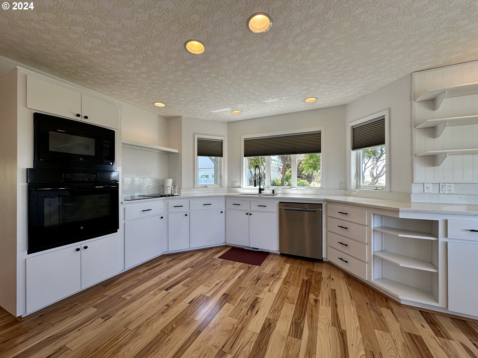 110 Eagle Drive Goldendale, WA 98620 - Photo 21 of 48 a kitchen with stainless steel appliances a refrigerator sink and stove