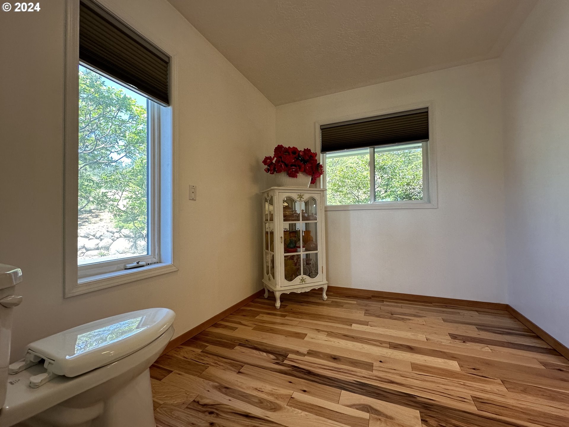 110 Eagle Drive Goldendale, WA 98620 - Photo 30 of 48 a bedroom with a bed and a window