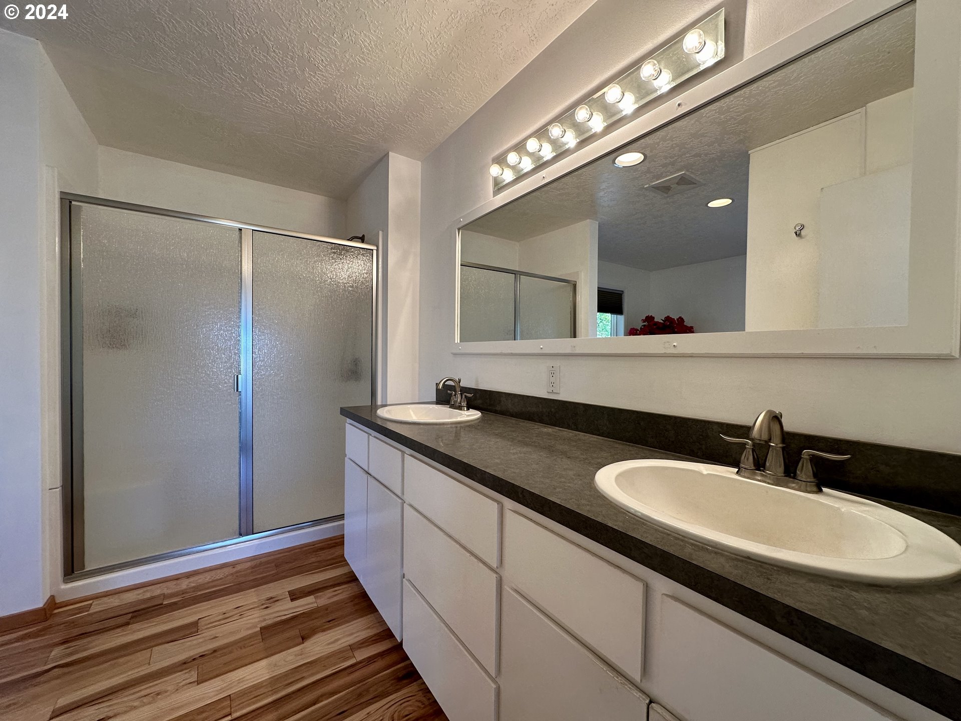 110 Eagle Drive Goldendale, WA 98620 - Photo 32 of 48 a bathroom with a double vanity sink and a mirror