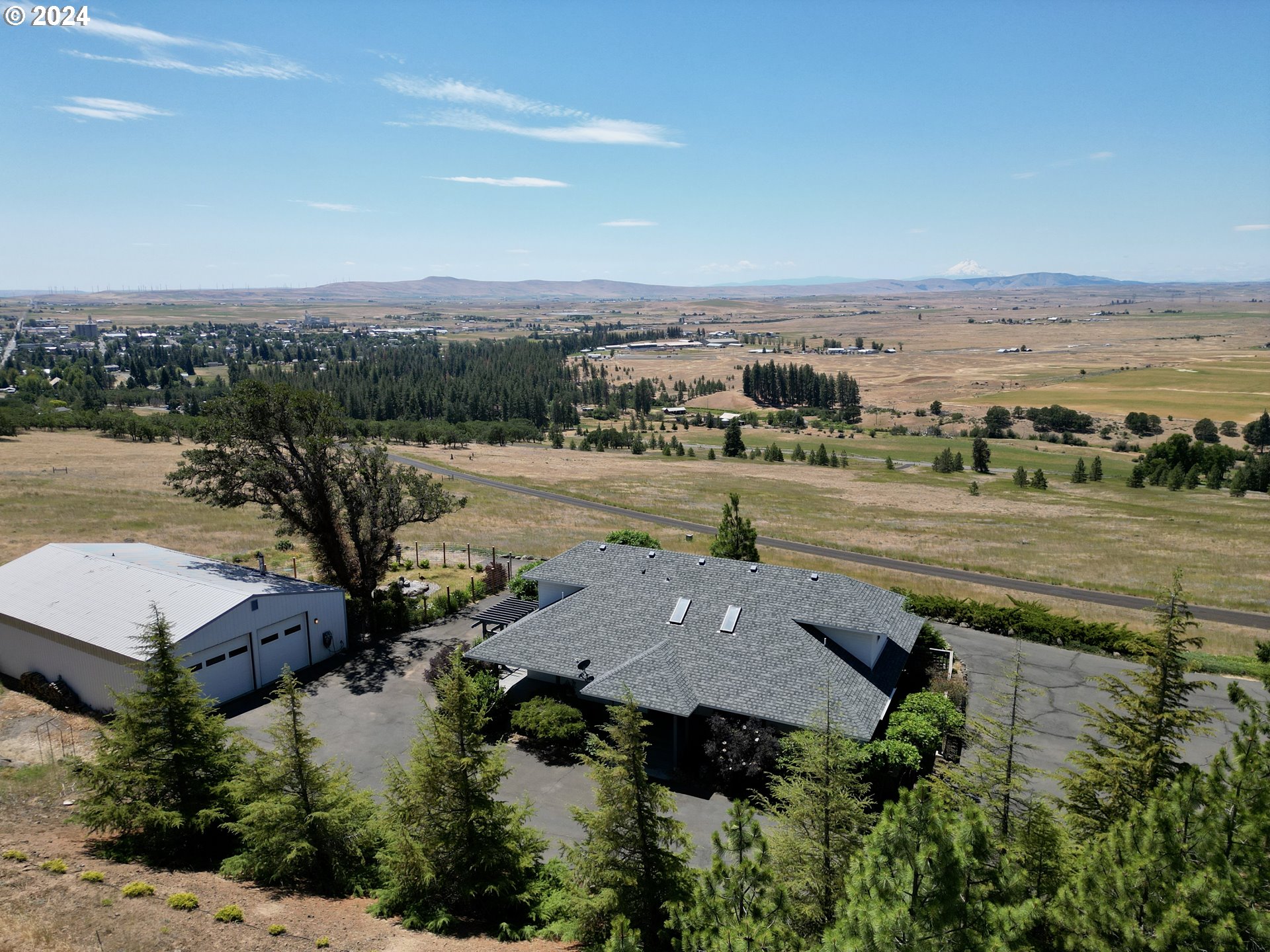 110 Eagle Drive Goldendale, WA 98620 - Photo 4 of 48 an aerial view of a house with outdoor space and lake view in back