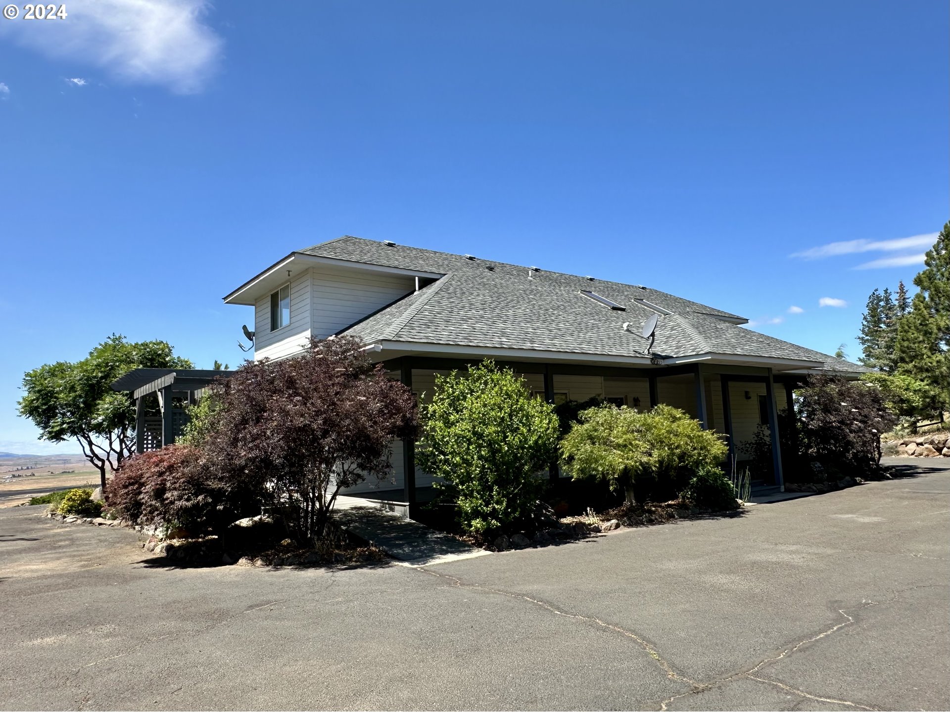 110 Eagle Drive Goldendale, WA 98620 - Photo 9 of 48 a front view of a house with a yard