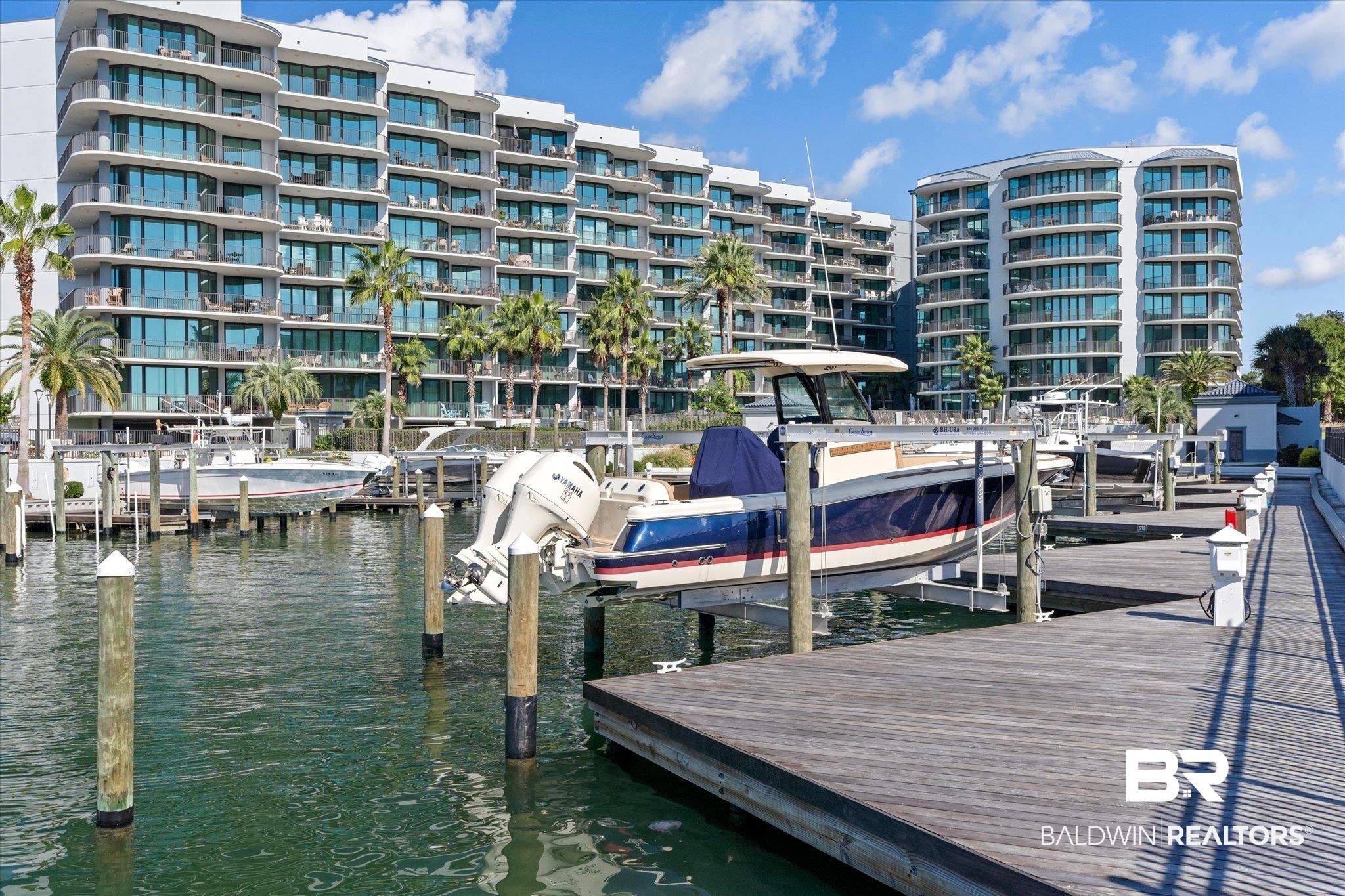27582 Canal Road, Unit 2611 Orange Beach, AL 36561 - Photo 27 of 37 View of dock featuring a water view